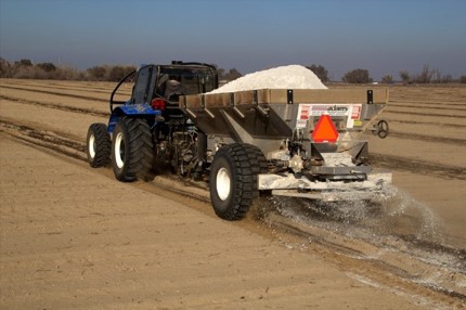 Figure 7. VR controller mounted to a tractor operates this dry spreader for precision application.