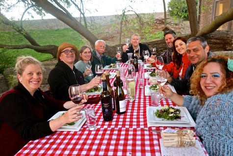 Sommeliers and vintners enjoying barbecue and fresh greens at KG Vineyard Management's Kolber Ranch: Farrah Felten Jolley (Klinker Brick), Diego Rech, Kendra Altnow (LangeTwins Family), Dr. Cliff Ohmart, Andrew Rich, Jason Eells and Kim Mettler Eells (Mettler Family), Brian Browning and Nicole Alonso.