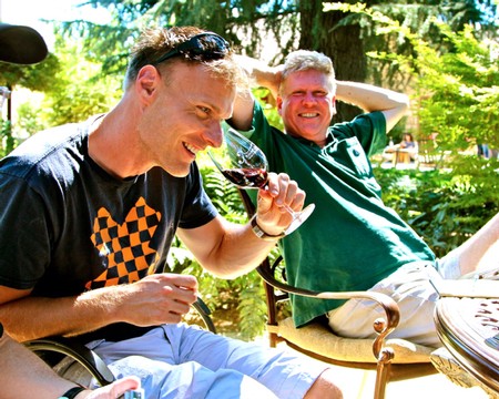 Lodi winemakers Markus Niggli and Layne Montgomery studiously tasting wine in leisurely fashion.