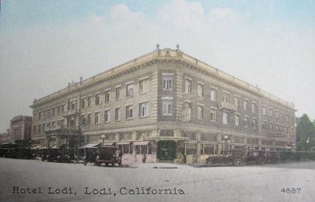 1915 postcard printed for Hotel Lodi (not to be confused with the Lodi Hotel, torn down at the corner of Sacramento and Pine in 1912), built at the corner of S. School and W. Pine, across the street from the Lodi Opera House, and renowned for being one of the first hotels to feature rooms with their own bathrooms, showers and telephones.