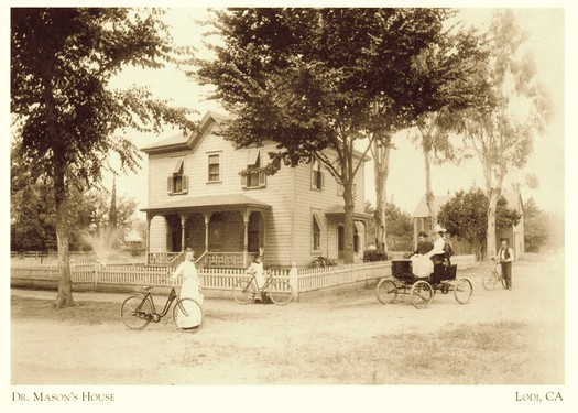 In 1900: The home of Dr. Wilton Mason, the proud owner of Lodi's first horseless carriage, locted at the corner of what is now N. School St. and W. Elm Street in Downtown Lodi.