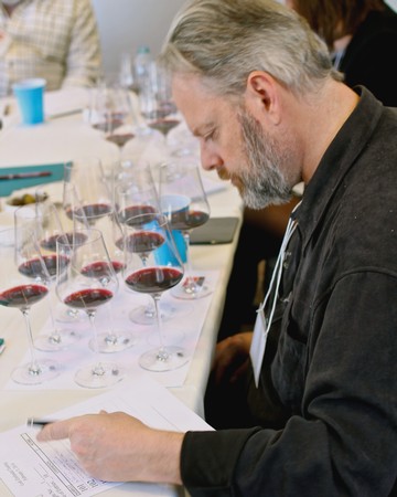 Widely respected wine educator Fred Swan evaluating Lodi Zinfandels in a blind tasting.